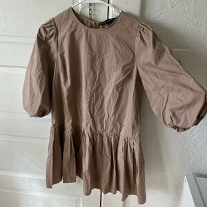 Tan dress with puffed sleeves
